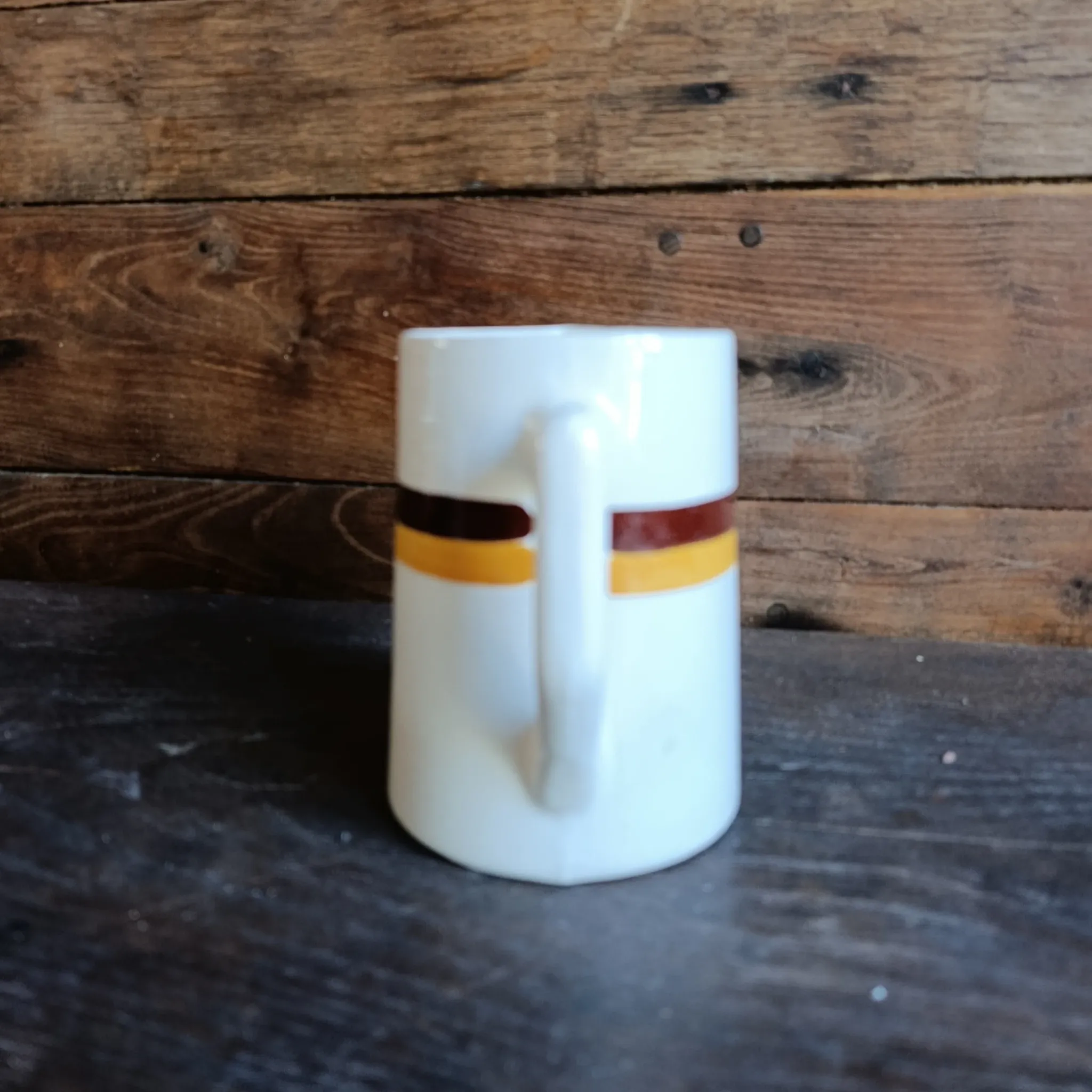 Vintage French ceramic pitcher with brown and ochre stripes