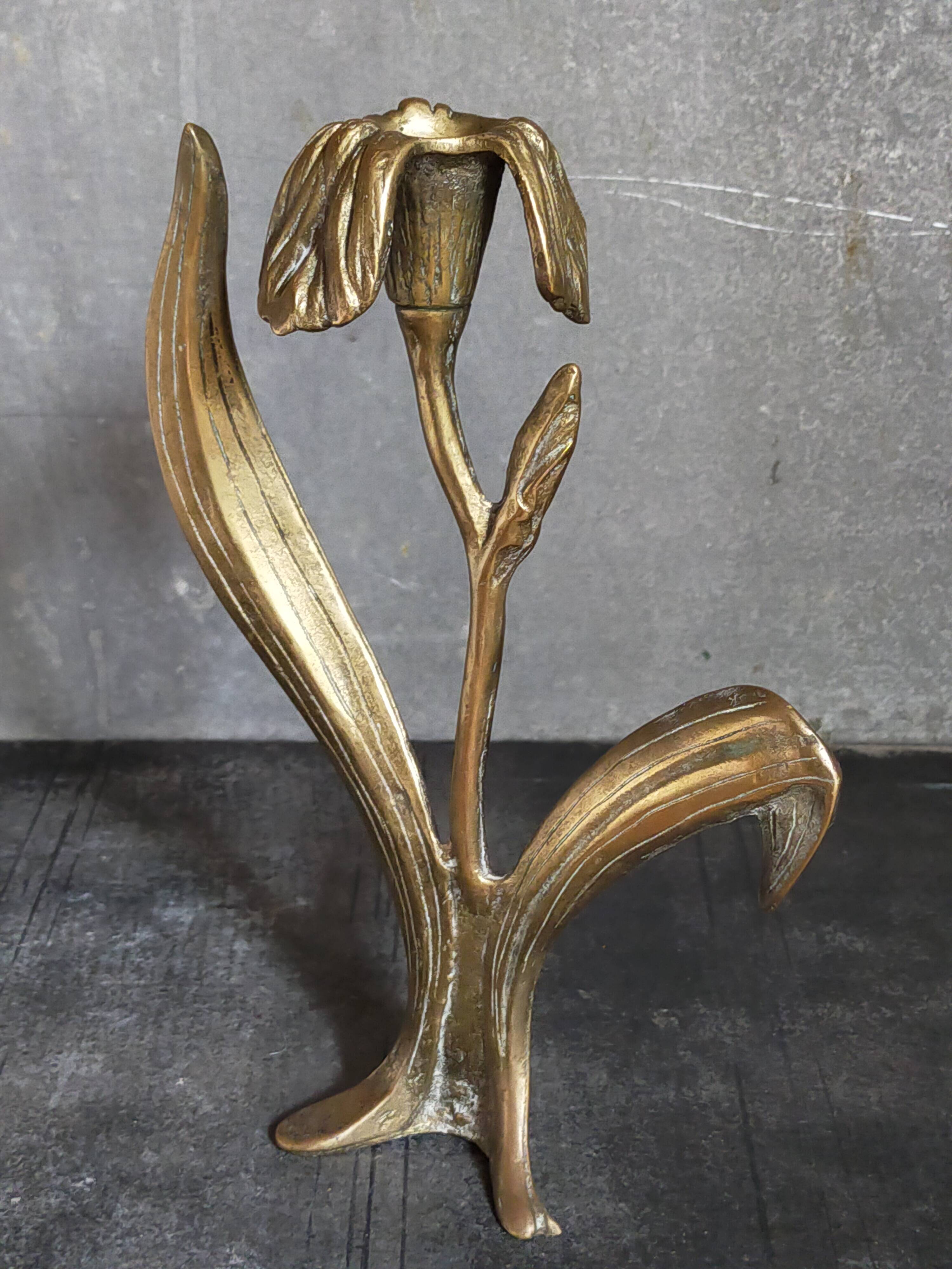 Old iris flower candle holder in solid brass