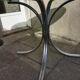 Chromed metal and smoked glass table