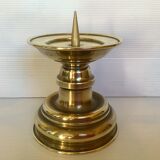 Old brass candle pique