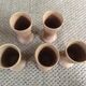 Series of 5 sandstone cups