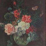 Oil on panel: still life with a bouquet of flowers on a bed