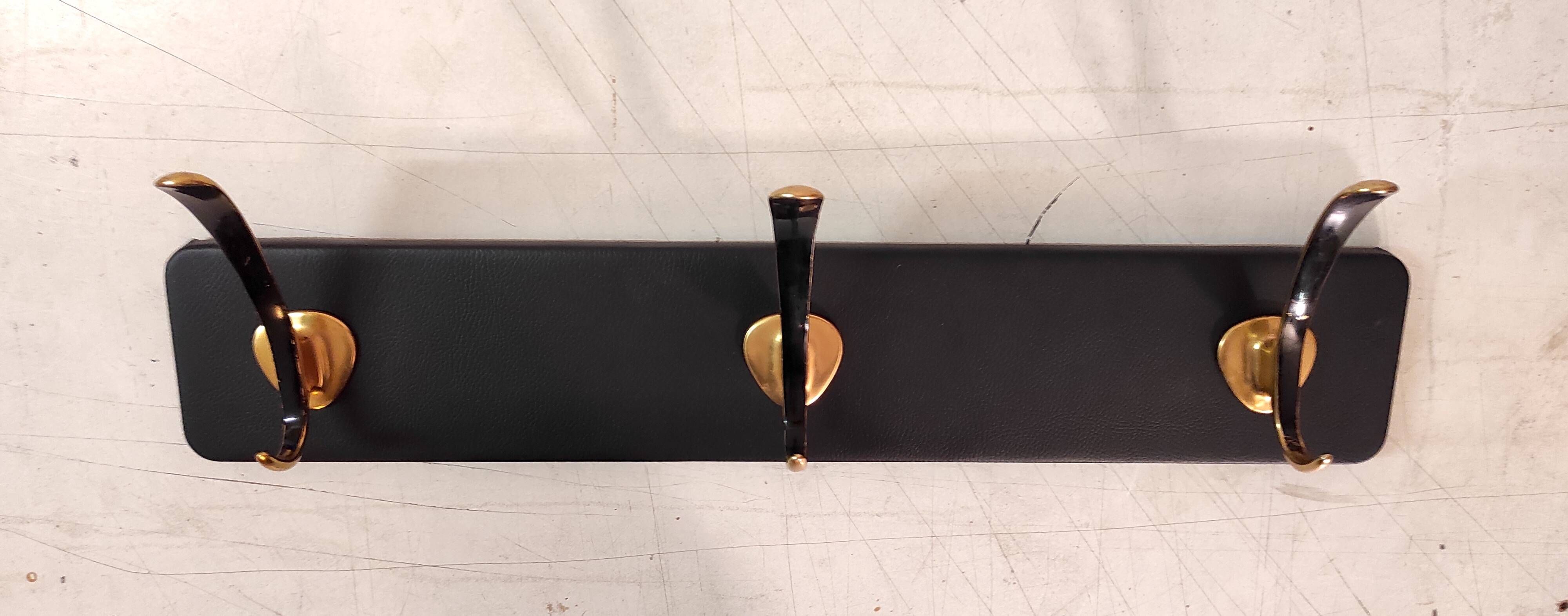 Wall-mounted coat rack in brass, 1950s-60s