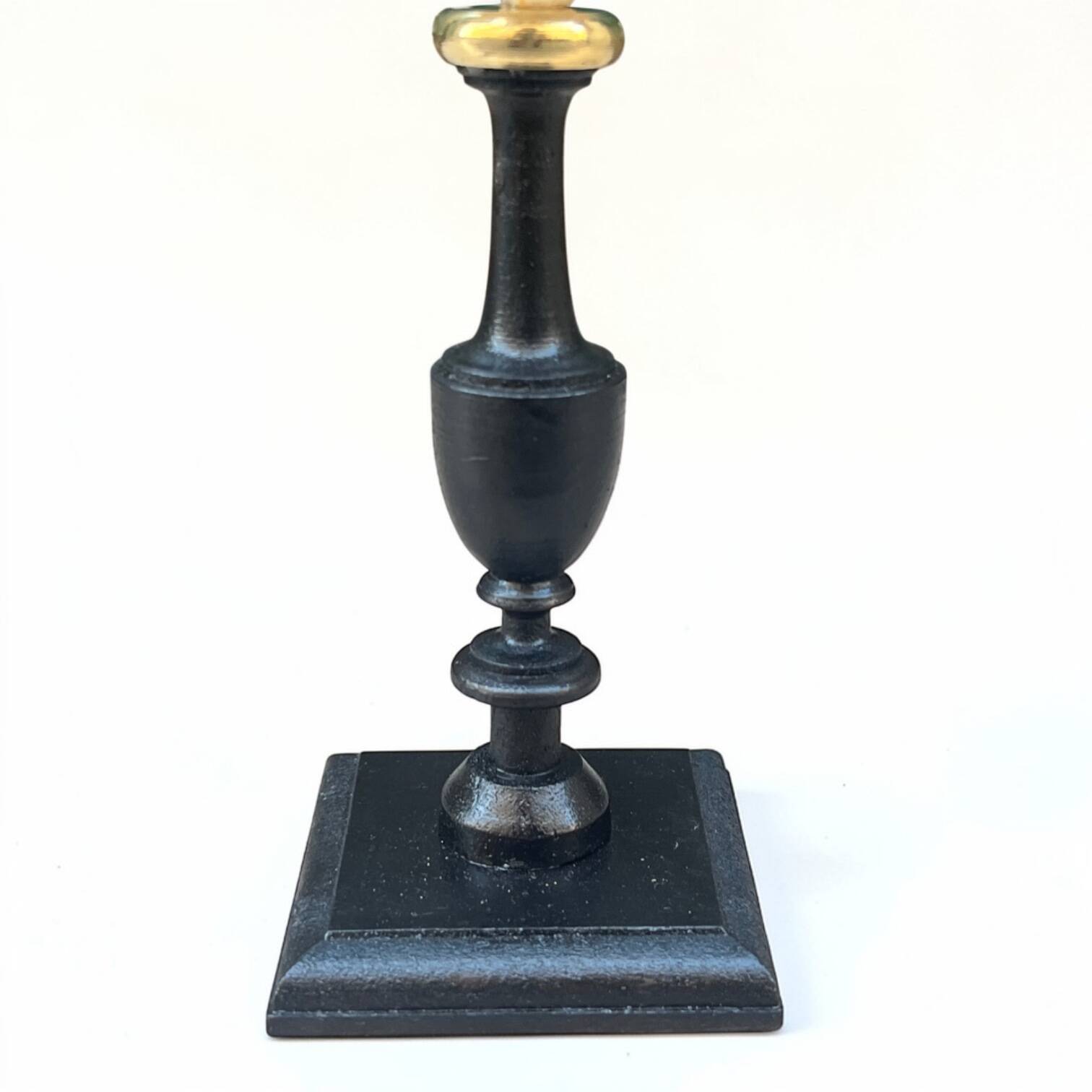 Murex shell on a turned blackened wooden base, 19th century.