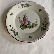 Plate of Nevers in earthenware late eighteenth century decoration of Chinese with pipe