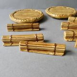 12 knife rests and 2 bottle coasters in earthenware