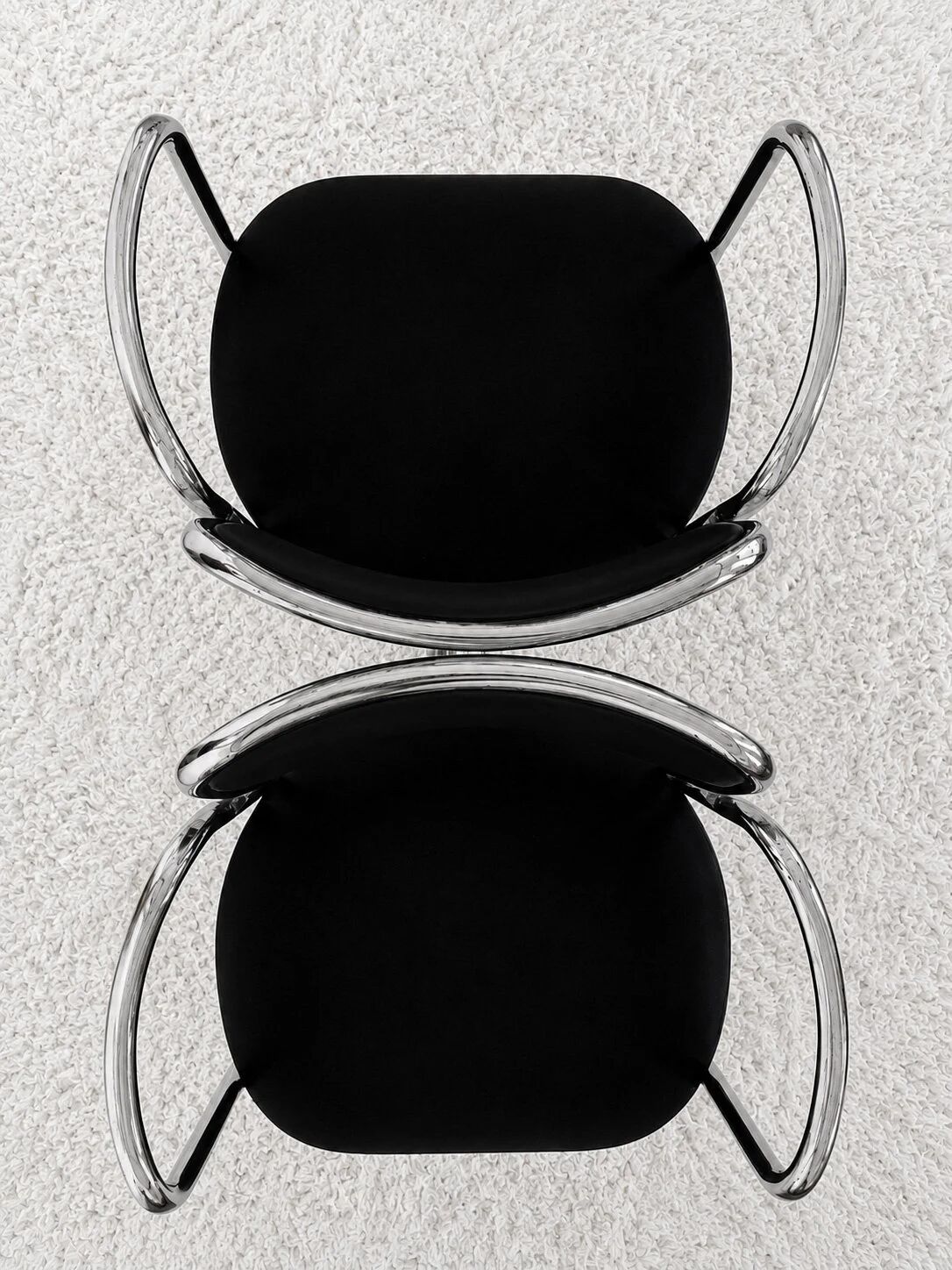 Vintage chairs with double chrome structure and black velvet. 70s