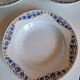 Set of 9 deep plates, earthenware from Creil Montereau, Colette model.