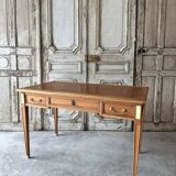 Directoire style flat desk circa 1960 in light cherry wood.