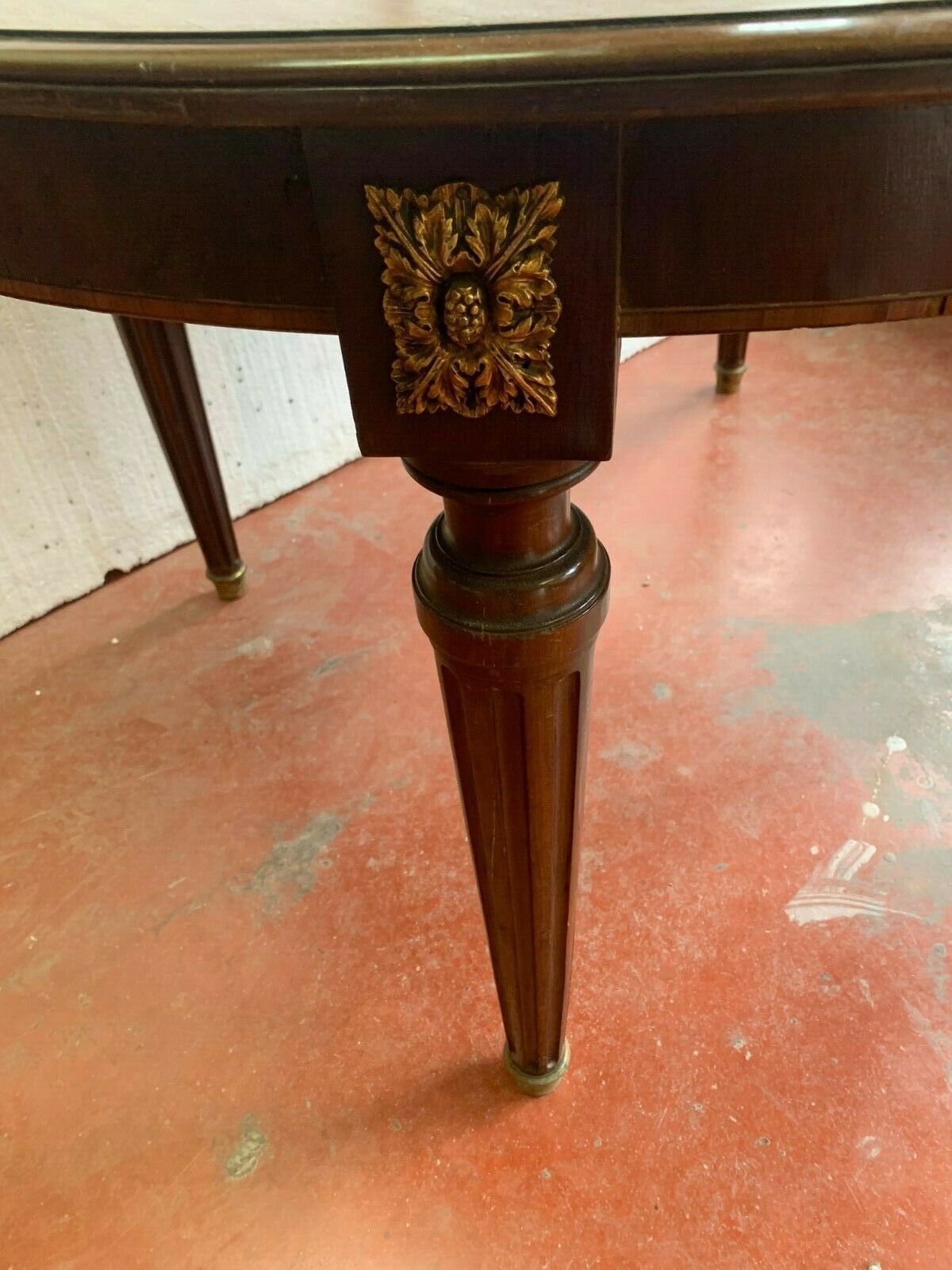 Louis XVI style table in mahogany and light wood 20th century