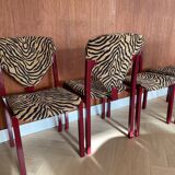 4 red lacquered zebra chairs