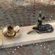 Table lamp, Biche, fawn in gilded brass on a beige marble base, art deco Velvet underside