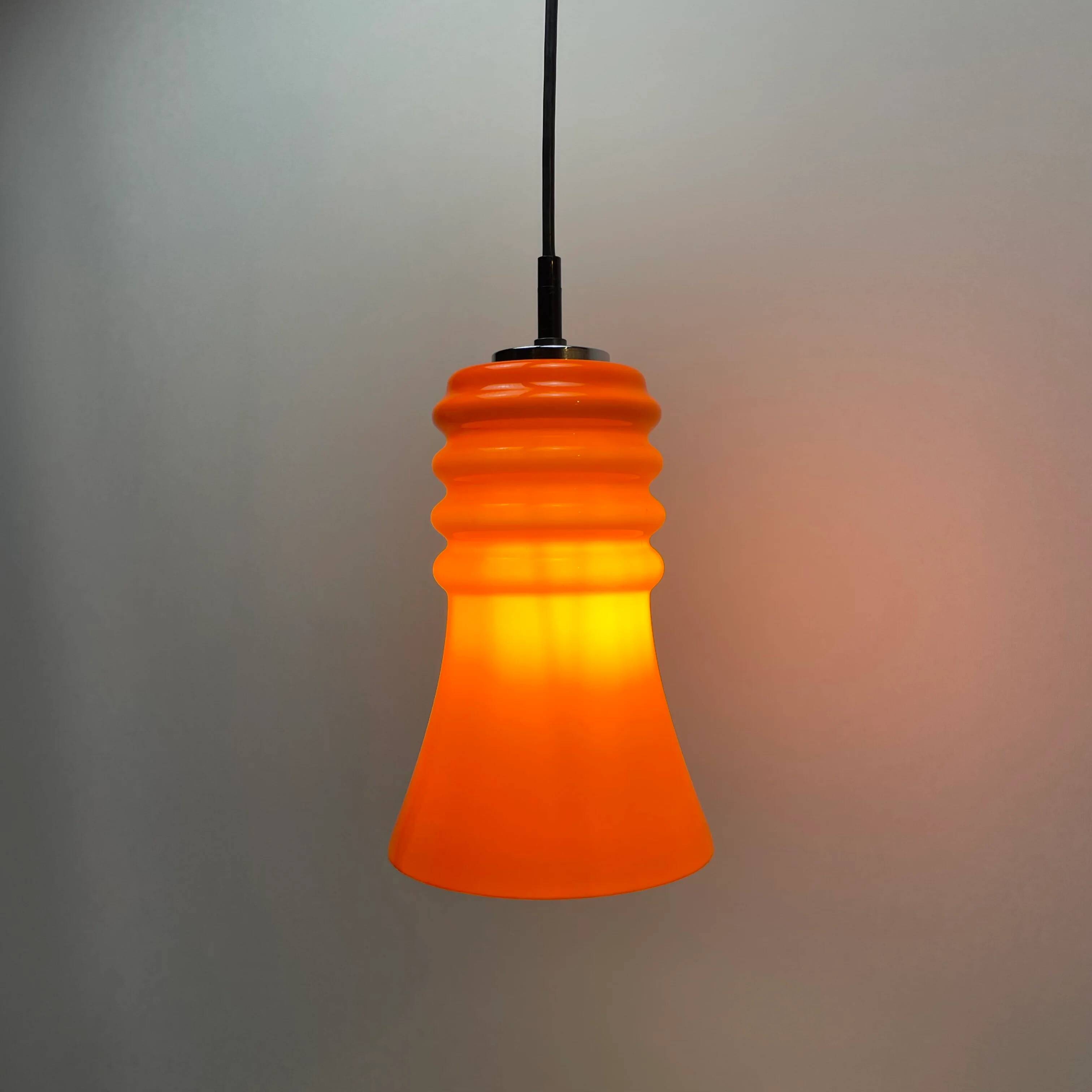 Rare orange glass trumpet-shaped pendant light by Peill & Putzler, 1960.