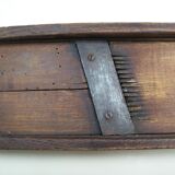 Old kitchen mandolin in wood and iron double blades