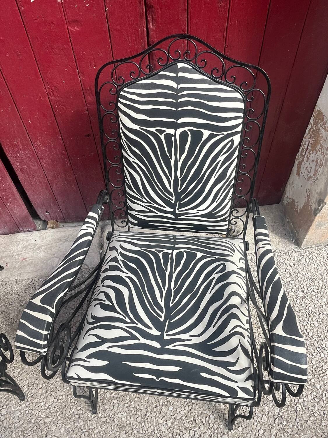 Pair of wrought iron armchairs