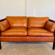 Canapé vintage danois des années 60 en cuir cognac pour 2 personnes.