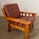 Old vintage Scandinavian design pine armchair from the 70s