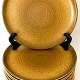 Suite of twelve round and flat stoneware table plates
