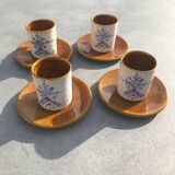4 ceramic cups and saucers