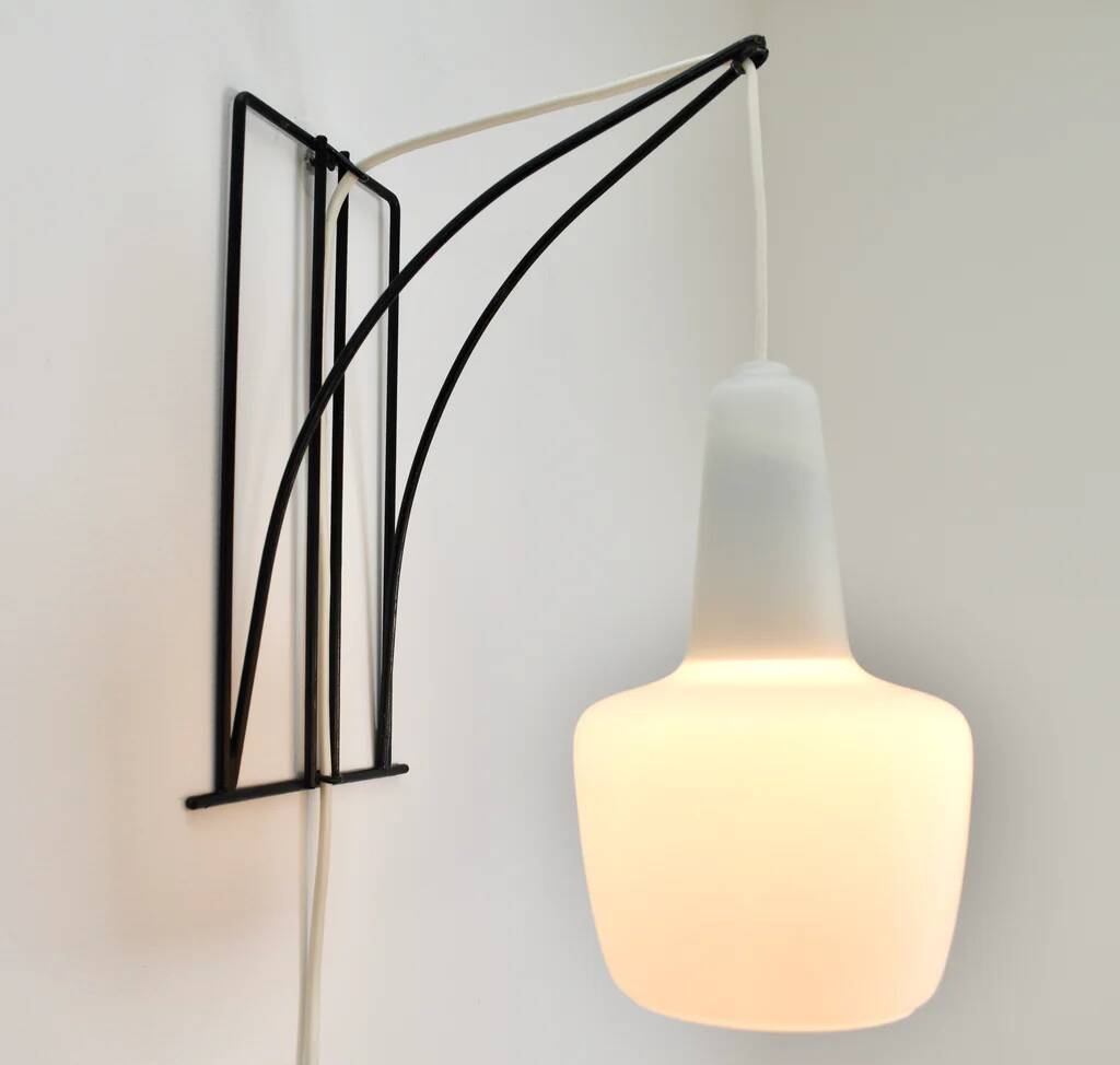 Modernist wall light with metal and glass wire