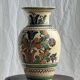 Large Provençal vase with beige background, green, blue and brown decoration of stylized plants