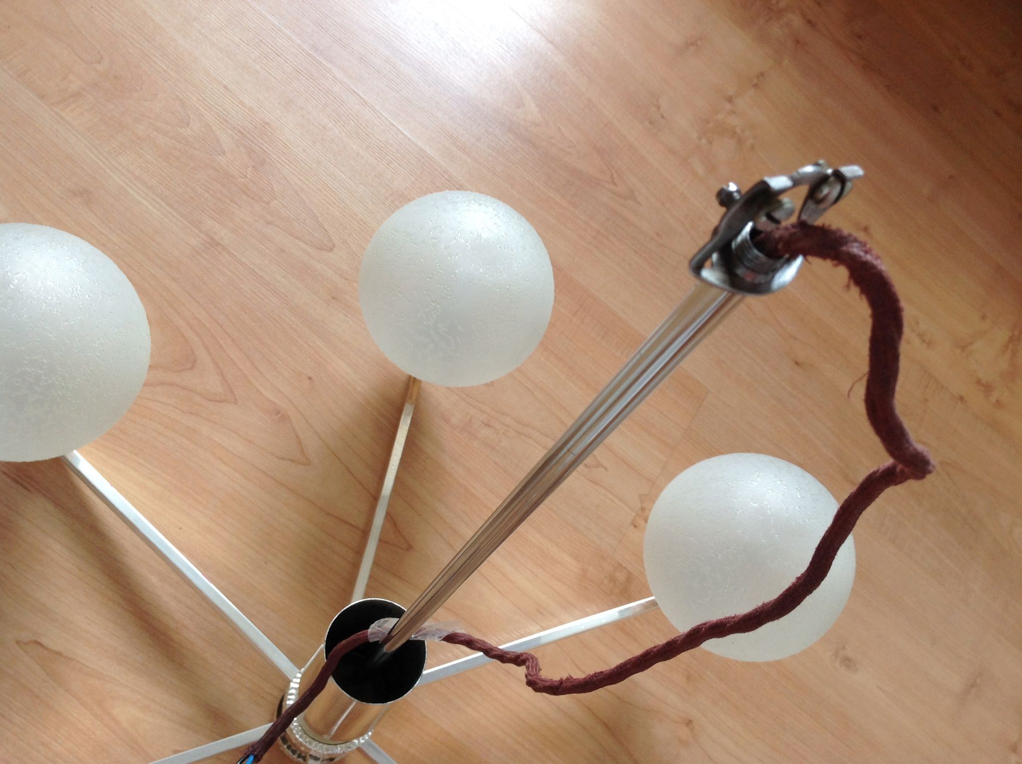 Six-light chrome metal chandelier and opaque glass globes / vintage 60s and 70s