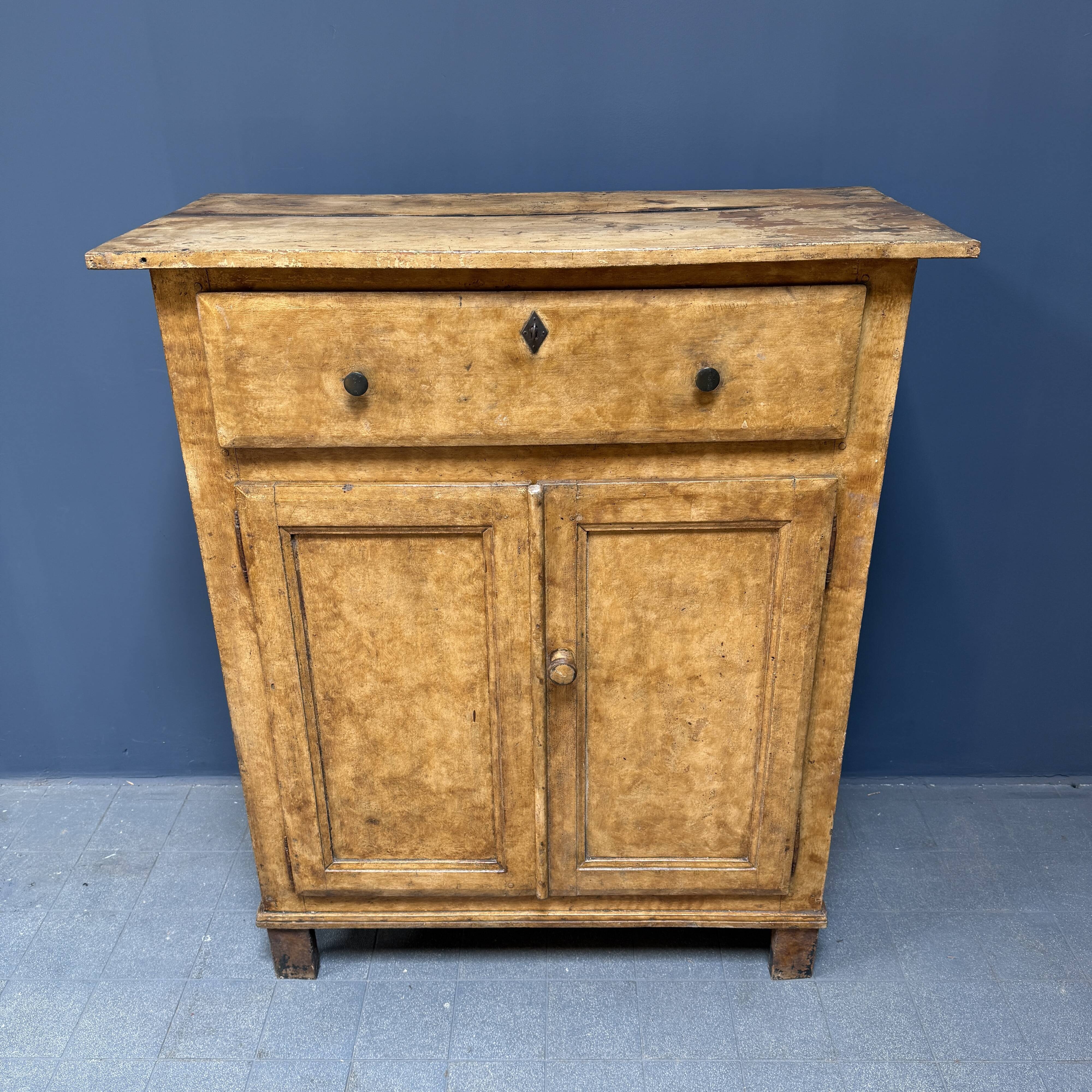 Old marbled ochre yellow French farmhouse cabinet