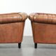Fauteuils club Chesterfield en peau de mouton de style anglais.