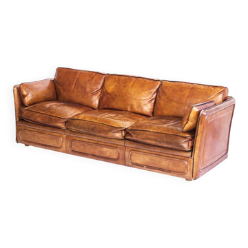 Vintage club sofa by Roche Bobois. Camel buffalo leather. France, 80s.