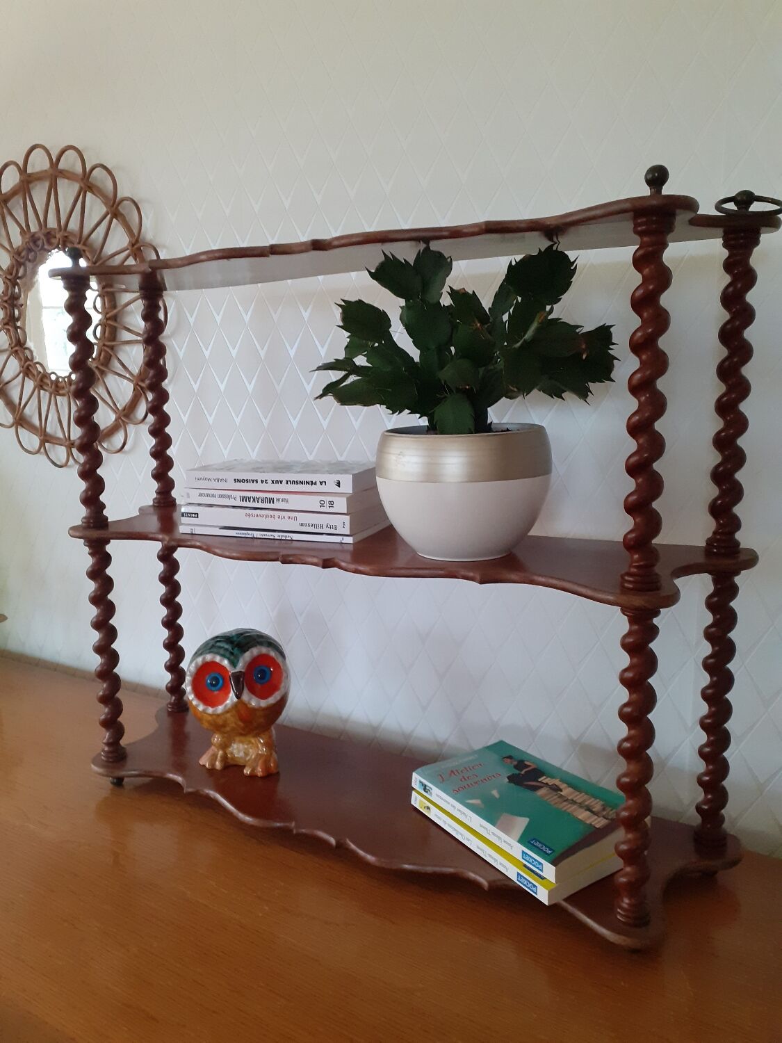 Turned wooden wall shelf