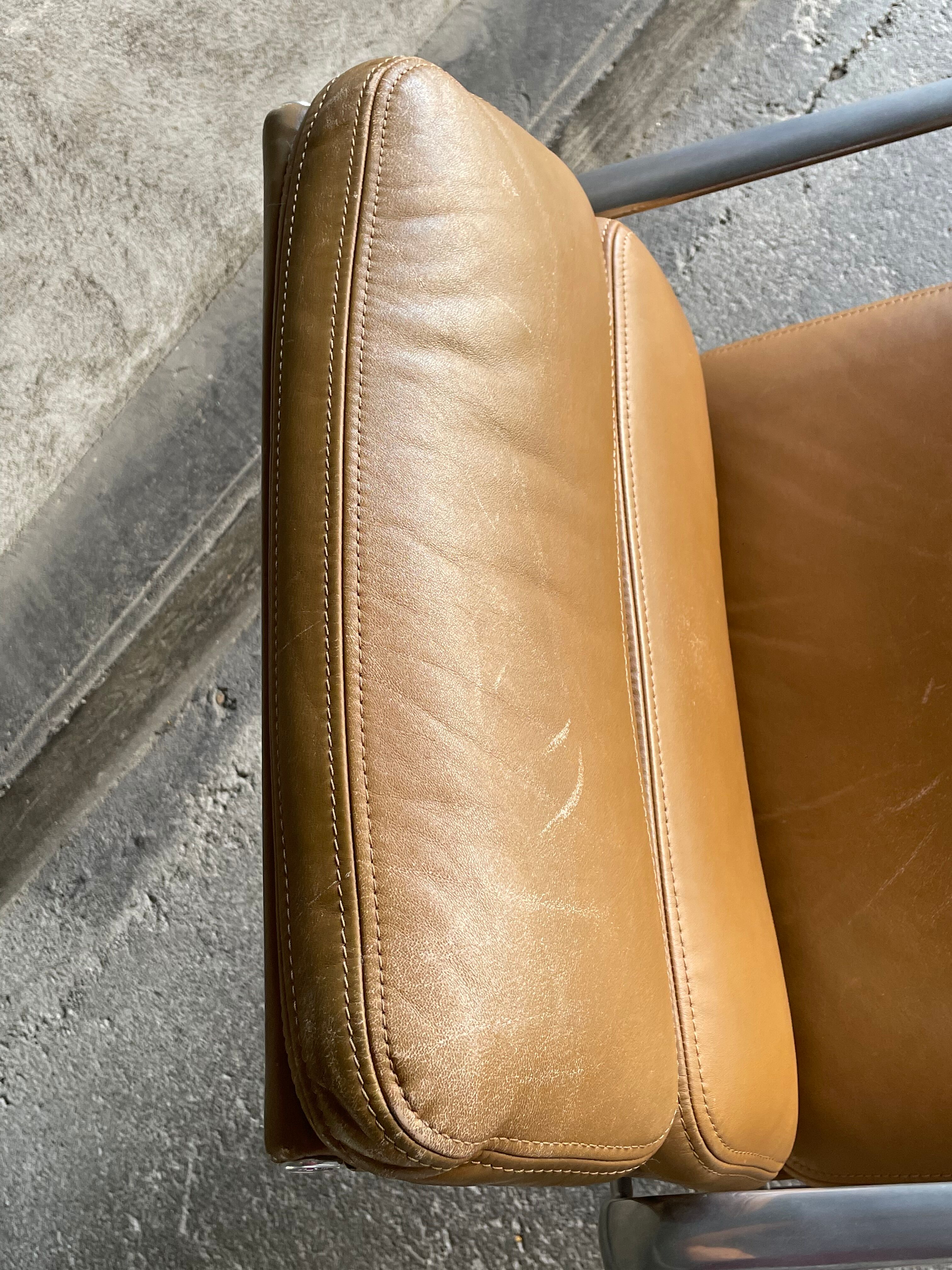 EA 208 camel leather armchair by Charles Eames for Herman miller