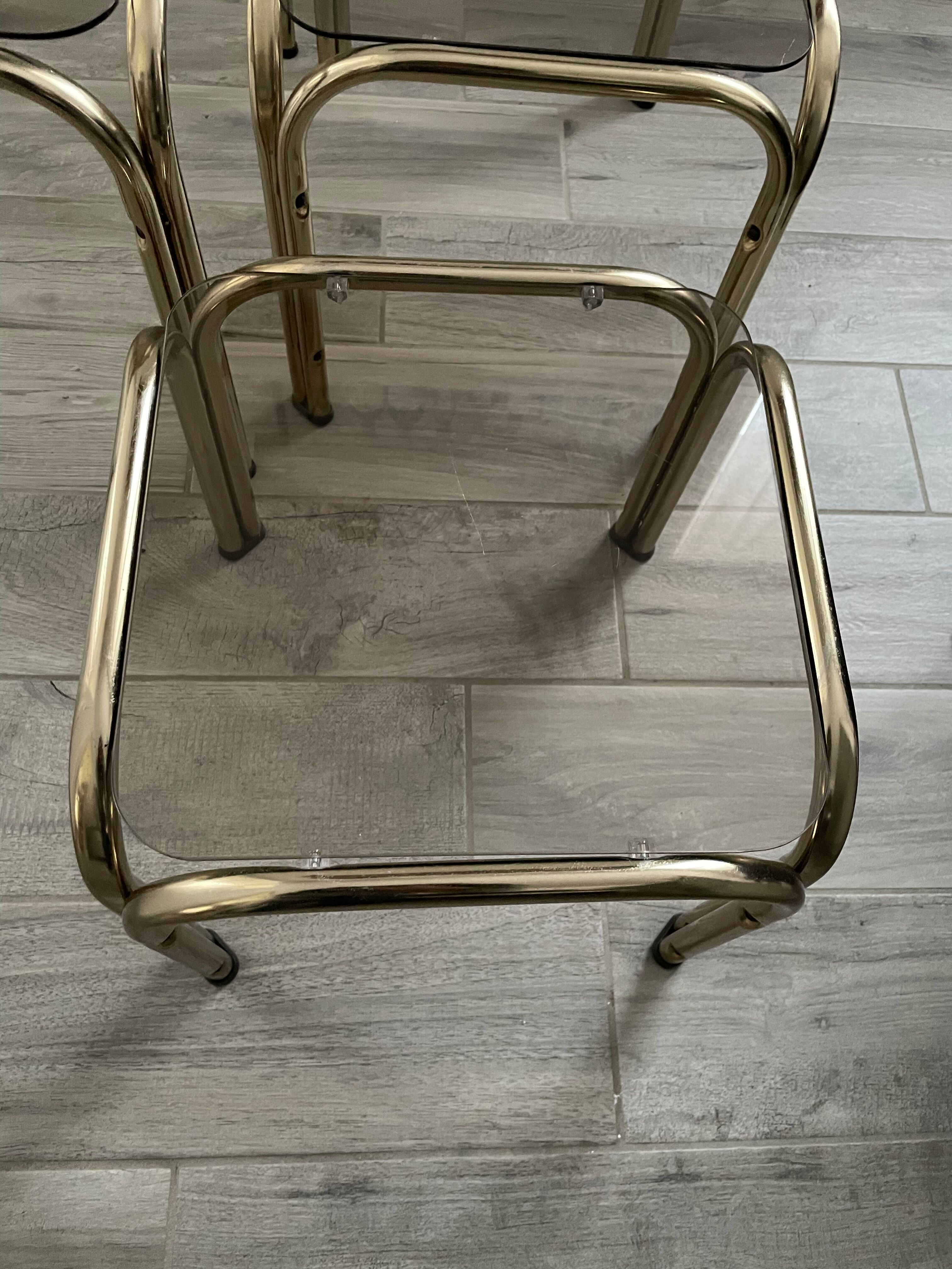 Pull-out tables in vintage smoked glass