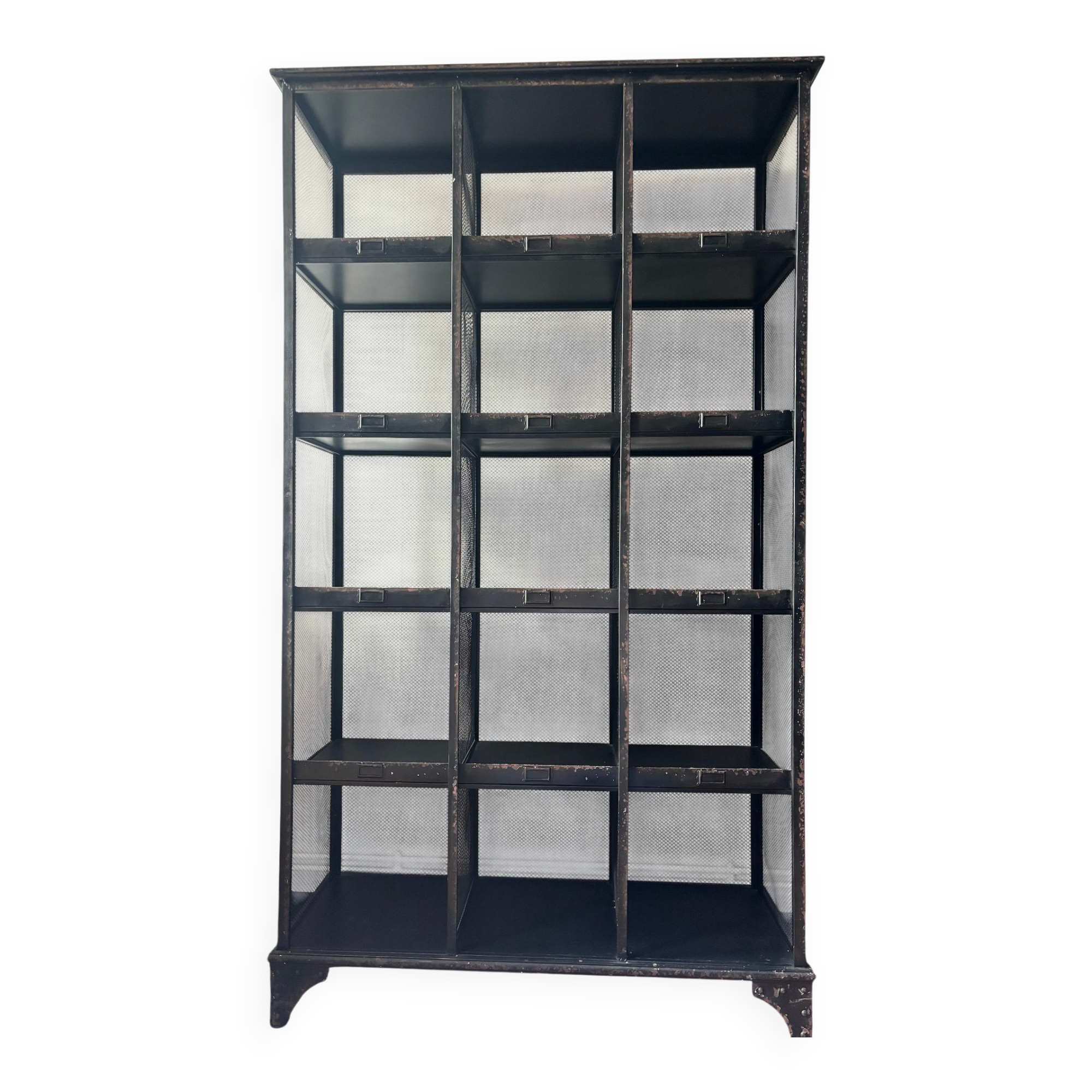 Black metal shelf with compartments.
