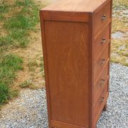 Vintage 1950s chest of drawers with tapered legs and 5 drawers.