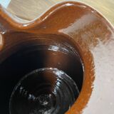 Glazed earthenware jug