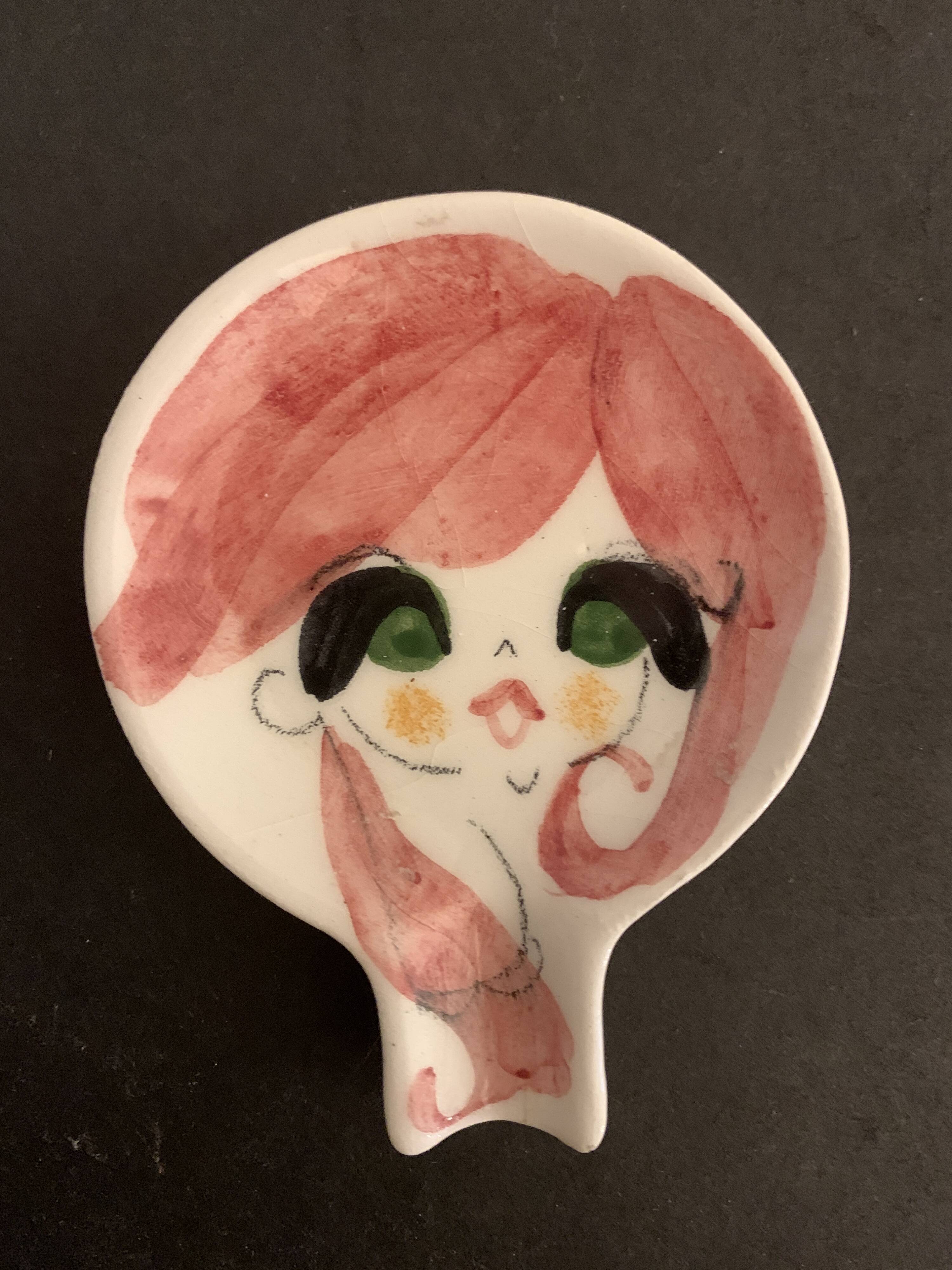 4 individual Italian ceramic stackable ashtrays with women's faces