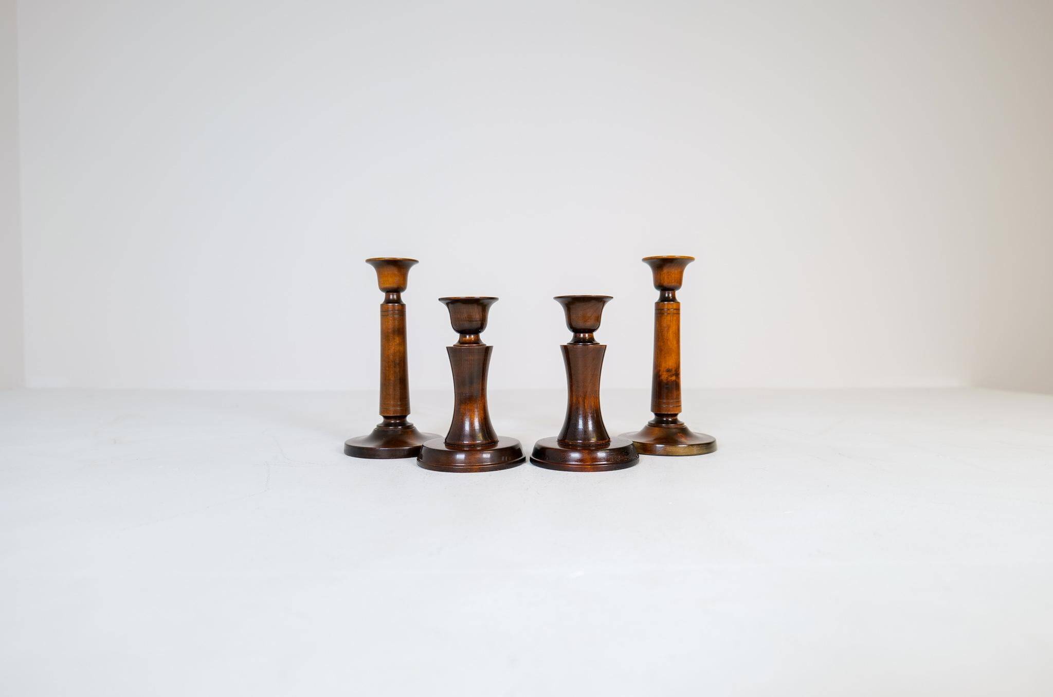 Mid-century set of 4 birch candlesticks by Carl Malmsten, Sweden, 1960s.
