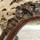 Miroir ovale mercure en bois sculpté décor nœud ruban 37X52