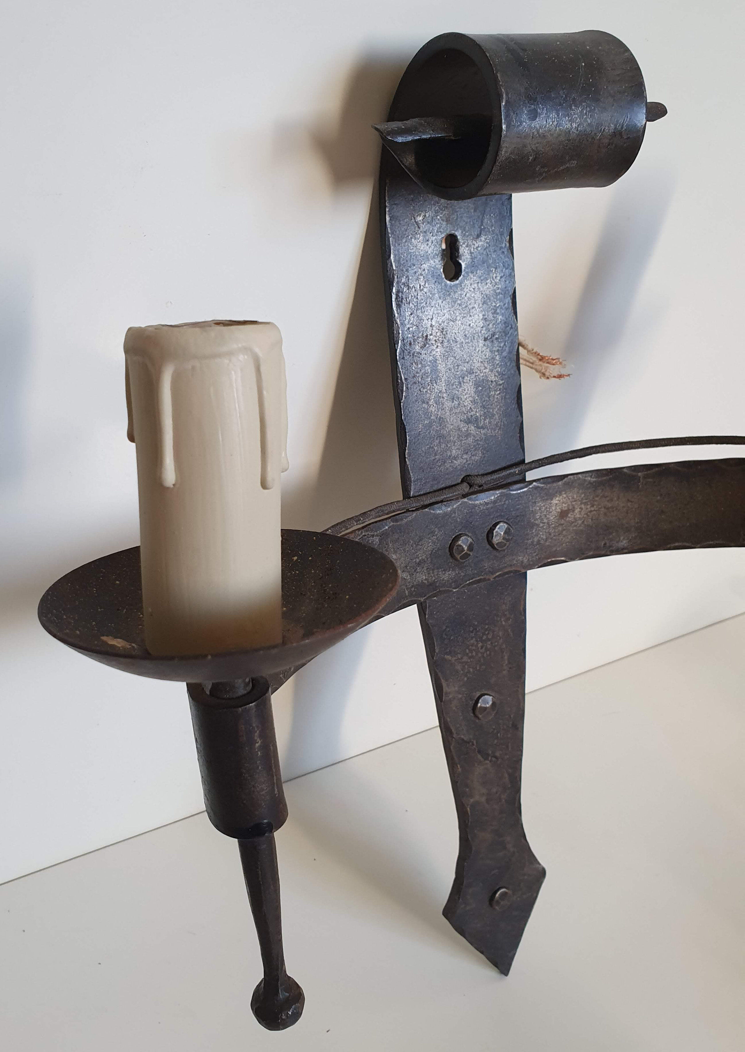 Duo of wrought iron wall lamps by Jean Touret Atelier Marolles