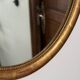 Oval mirror with gilded wood, Napoleon III medallion.