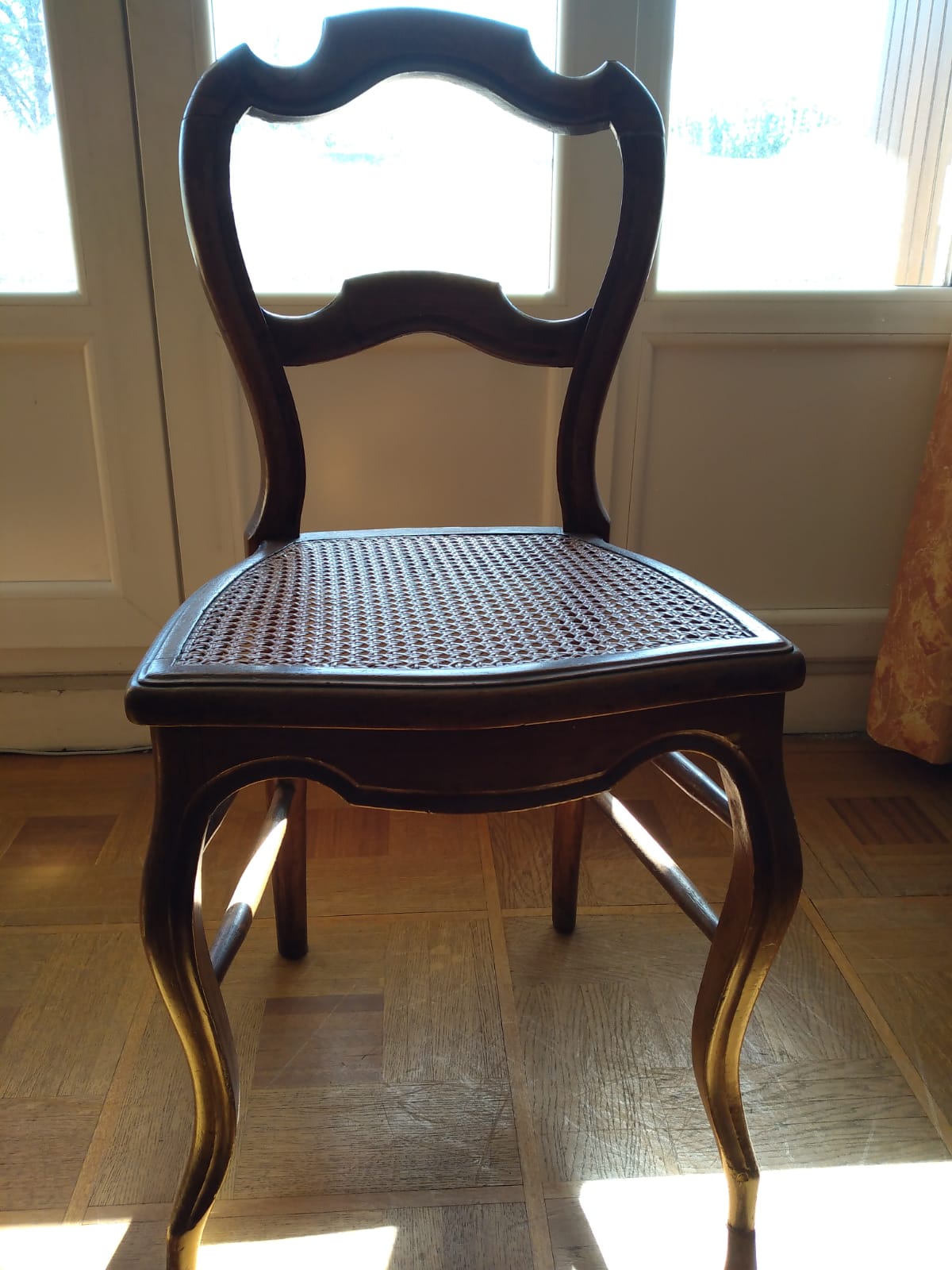 6 mulched solid wood chairs and 2 canework chairs