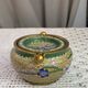Enamelled brass ashtray