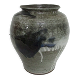 Ovoid vase in varnished sandstone