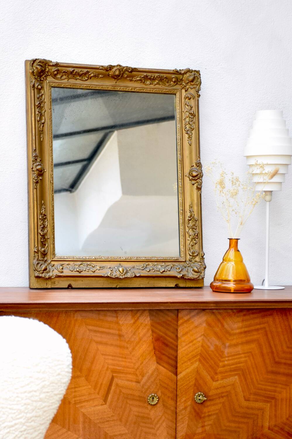 Antique mirror with gilded moldings