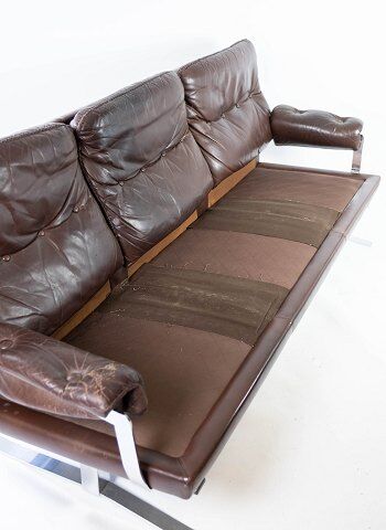 Three seater sofa upholstered with patinated brown leather by Arne Norell, 1970s