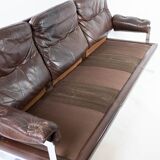 Three seater sofa upholstered with patinated brown leather by Arne Norell, 1970s