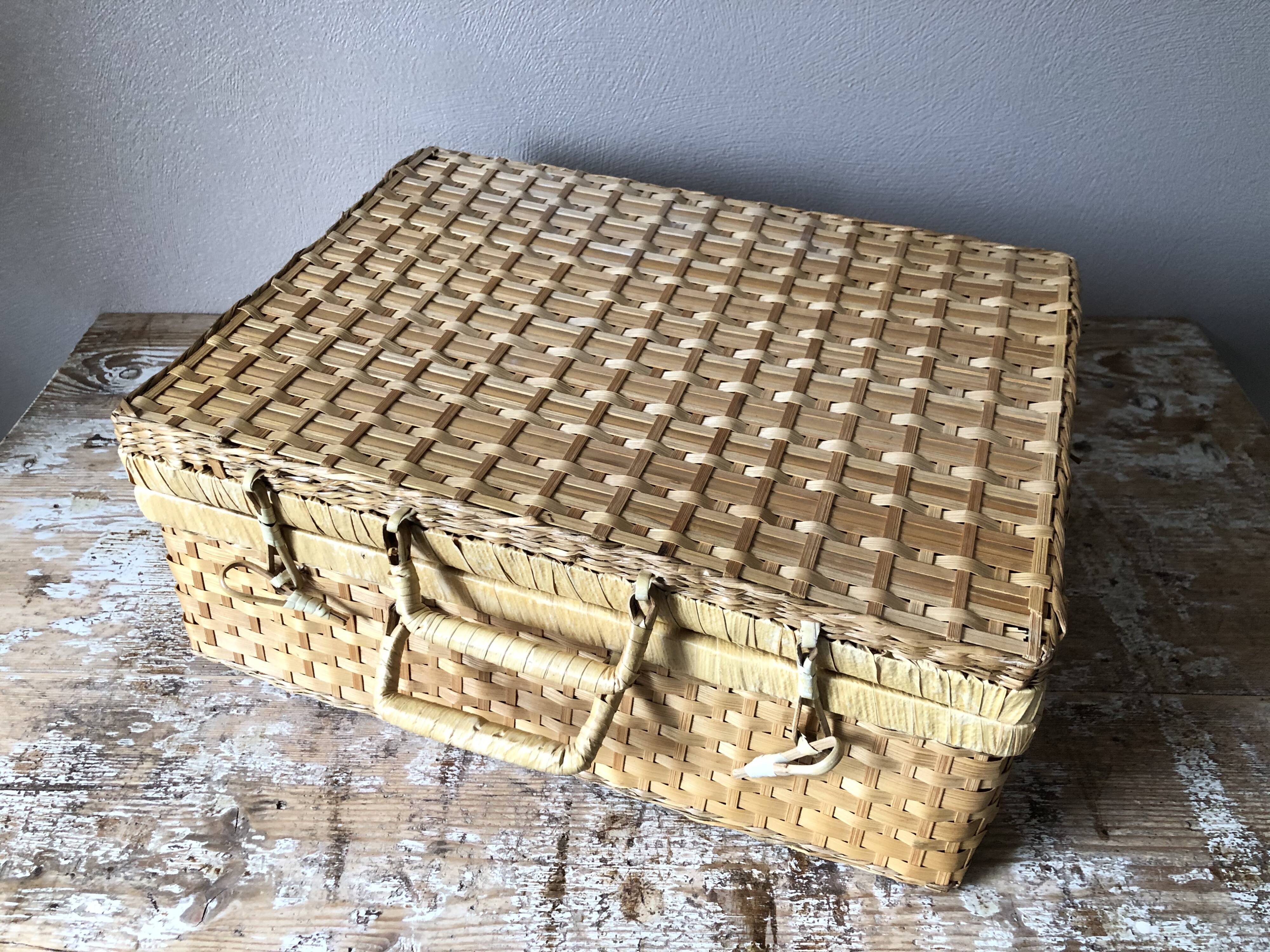 Vintage woven wicker suitcase