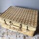 Vintage woven wicker suitcase