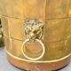 Large brass champagne bucket with baroque lion from the 19th century.