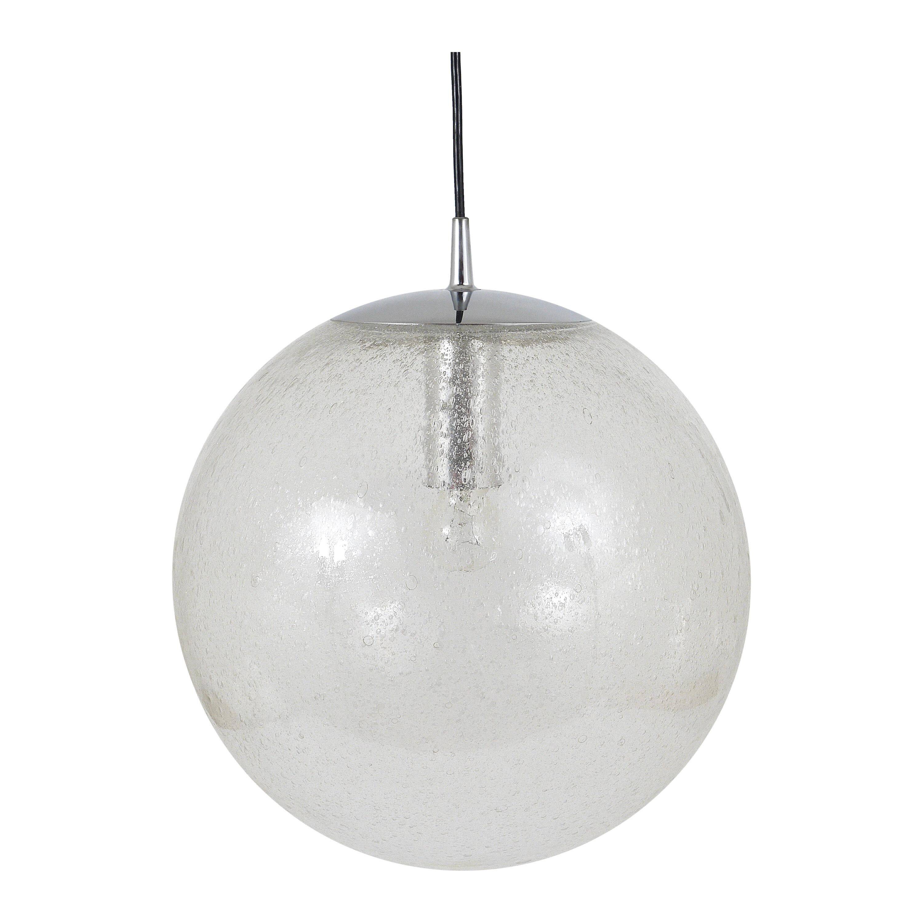 Large glass globe pendant light with bubbles and chrome by Peil & Putzler, Germany, 1970s.